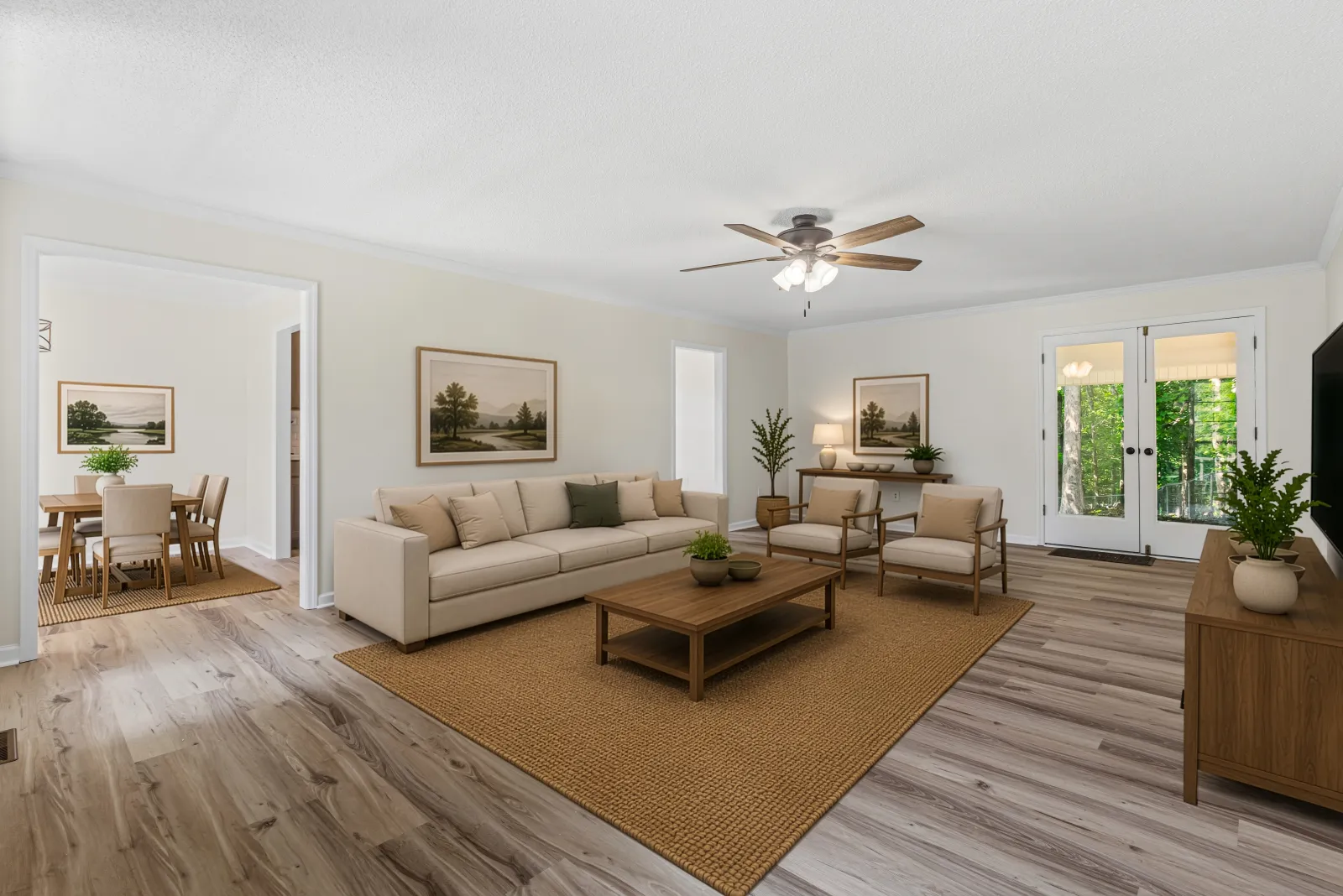 Open living and dining area virtually staged with a sectional, a dining table for four, a media console, and a leafy plant by the French doors